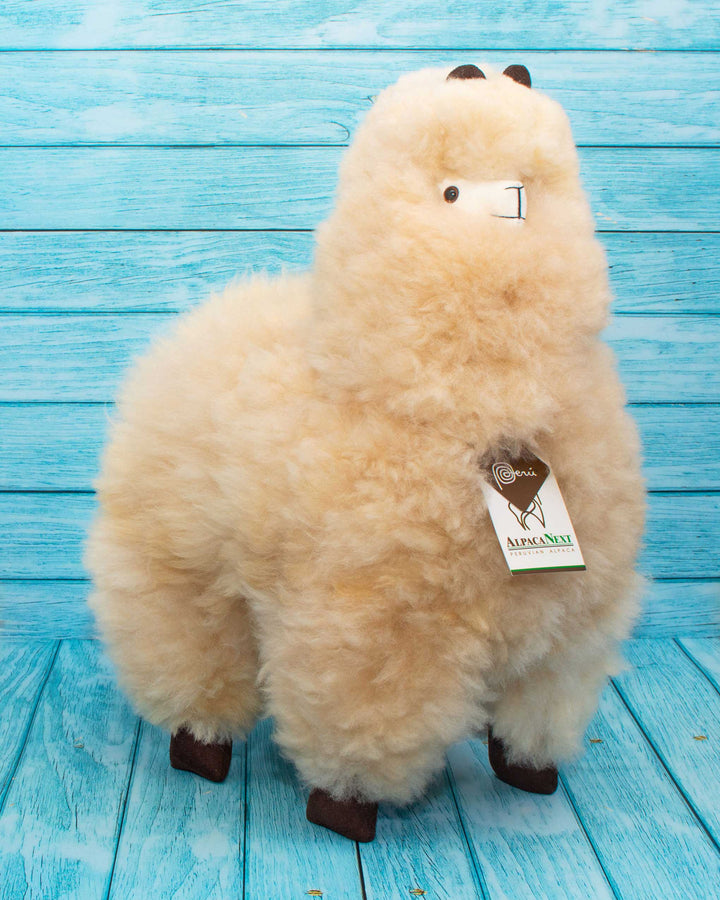 Soft alpaca fur stuffed animal. Beige, 18 inches.