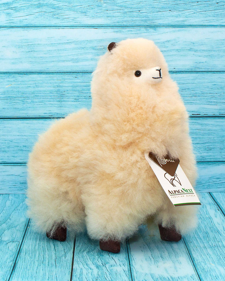 Soft alpaca stuffed animal. Beige, 9 inches.