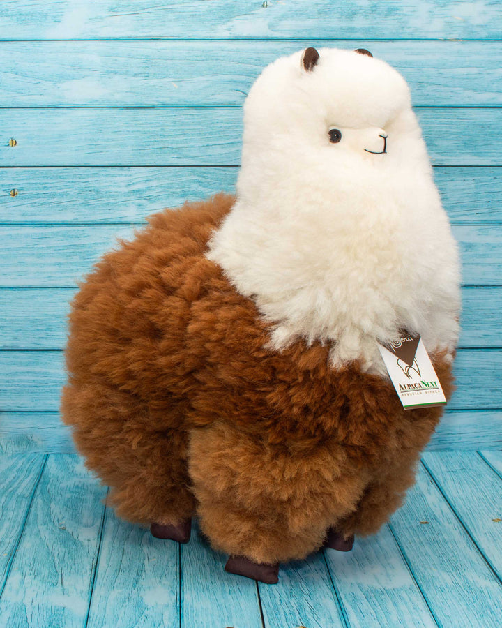 Soft alpaca fur stuffed animal. Brown and white, 18 inches.