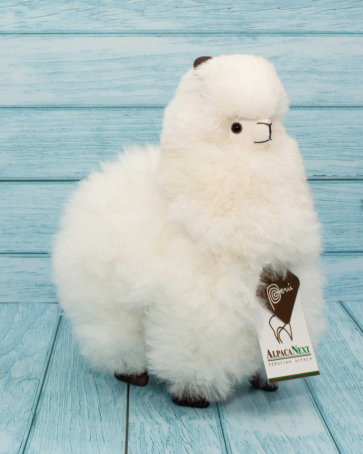Soft alpaca stuffed animal. White, 9 inches.