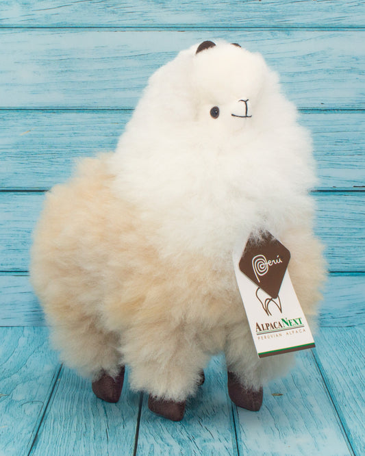 Soft alpaca stuffed animal. Beige and white, 9 inches. 