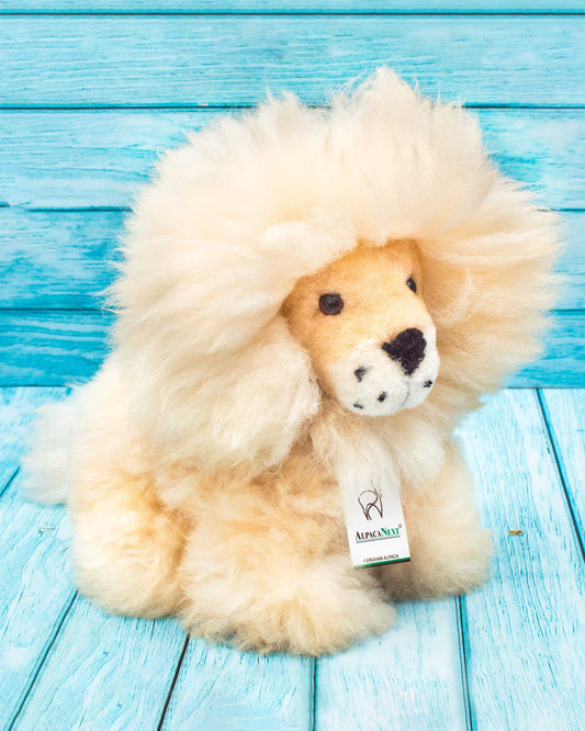 Soft stuffed lion handmmade on natural alpaca wool. 
