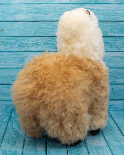 Soft alpaca fur stuffed animal. Beige and hite, 18 inches. Back view