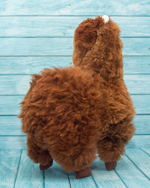 Soft alpaca fur stuffed animal. Brown, 18 inches. Back view