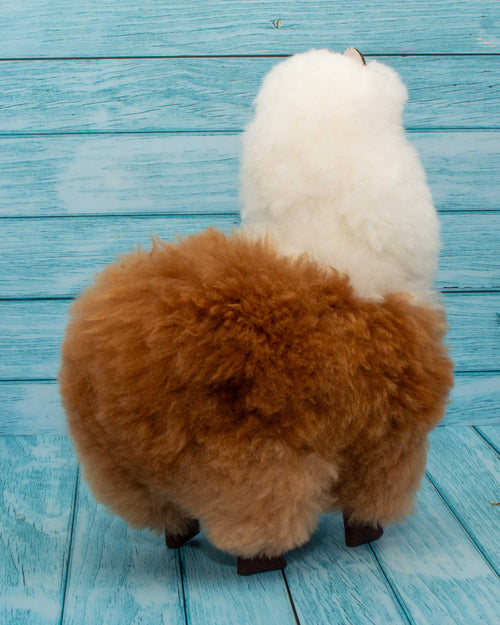 Soft alpaca fur stuffed animal. Brown and White. 12 inches.  Back view