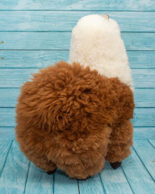 Soft alpaca fur stuffed animal. Brown and white, 18 inches. Fluffy and cuddly