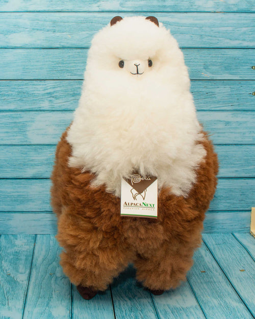 Soft alpaca fur stuffed animal. Brown and white, 18 inches. Lovely eyes