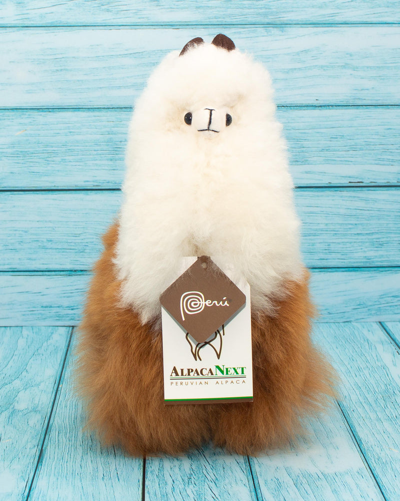 Soft alpaca stuffed animal. Brown and white, 9 inches. Charming eyes