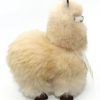 Lateral view of the AlpacaNext 9 inch beige alpaca figure highlighting the density of the fur