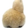 Back view of the AlpacaNext 9 inch beige alpaca figure highlighting the density of the fur
