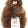 Frontal angled view of the AlpacaNext 9 inch brown alpaca showing its exquisite natural texture