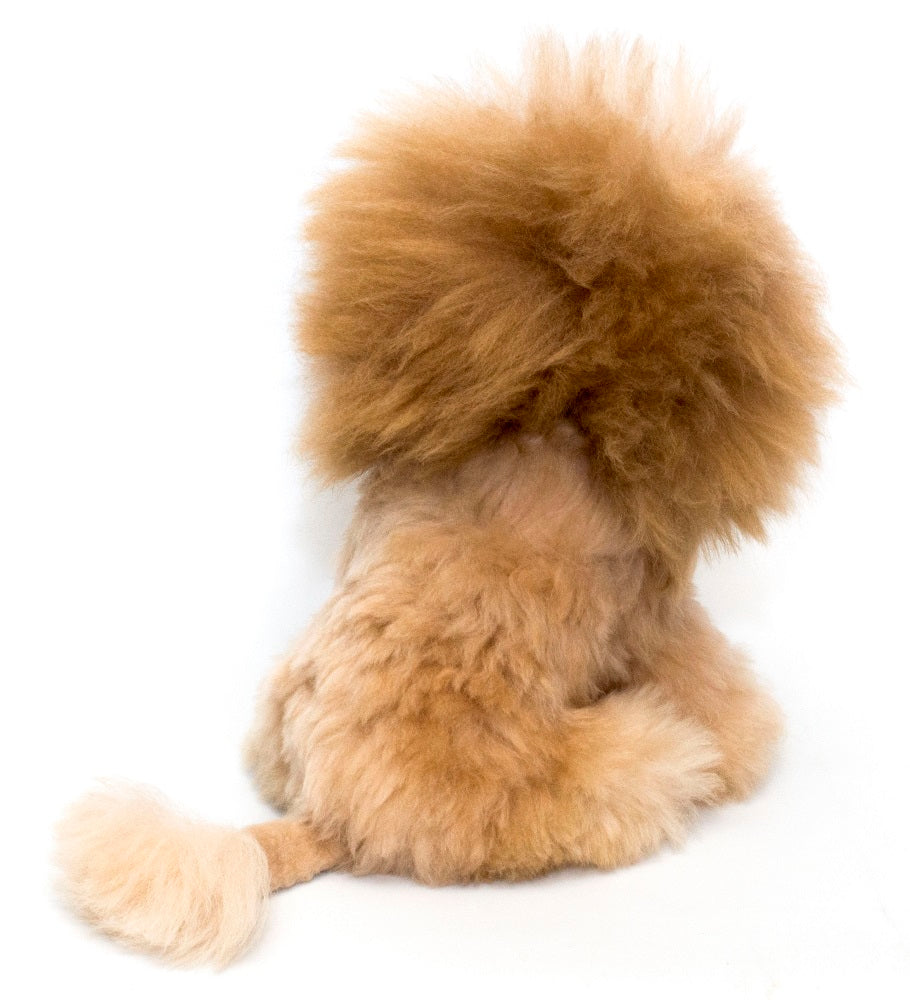 Full back view of the AlpacaNext luxury alpaca lion highlighting the dense and cozy baby alpaca fur