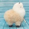 Soft alpaca stuffed animal. Beige and white, 9 inches. Ready to smile