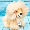 Soft stuffed lion handmmade on natural alpaca wool.