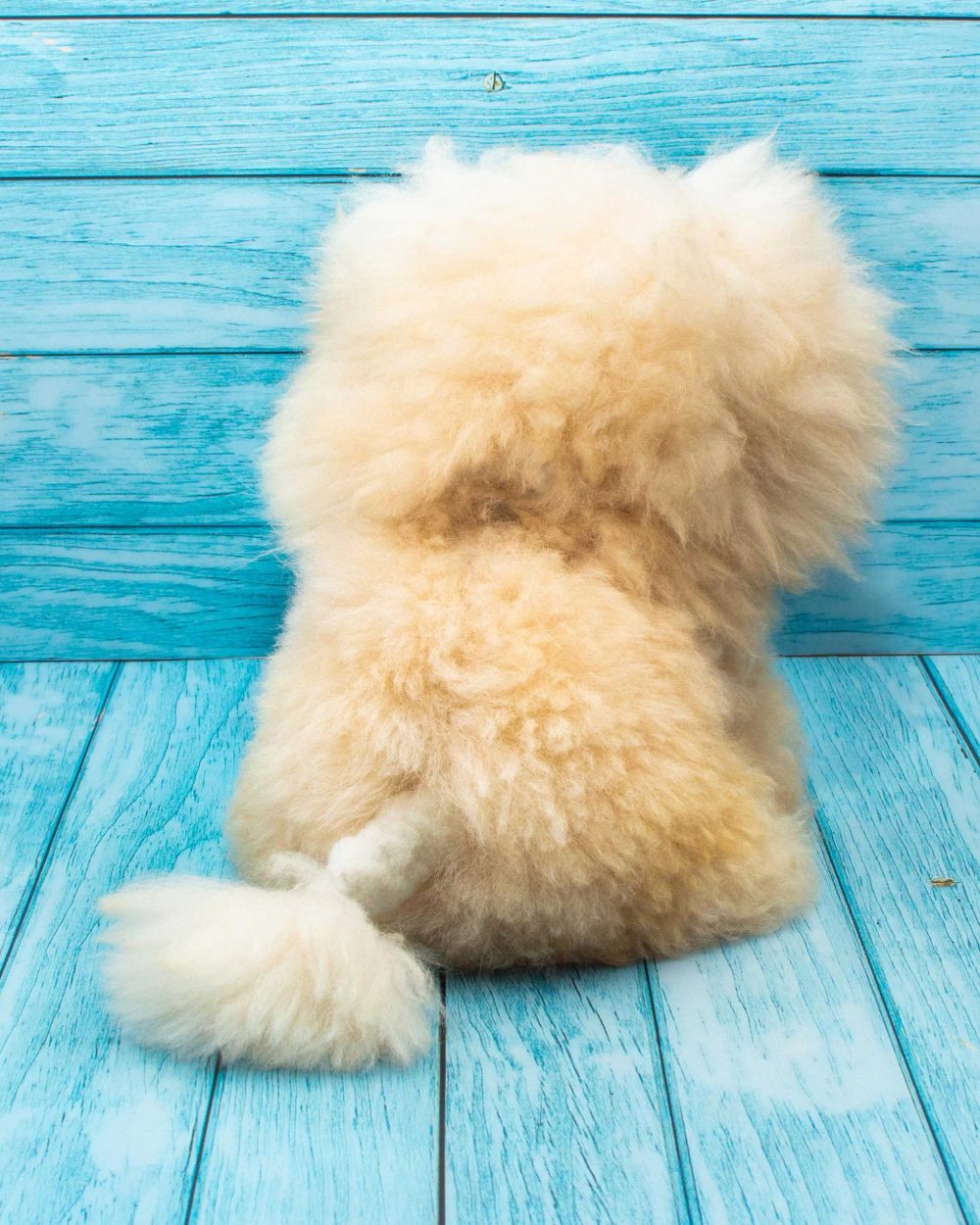 Soft stuffed lion handmmade on natural alpaca wool. Waiting for you